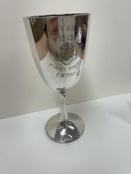 100 yard trophy from 1913, engraved 'First Prize F. W. Pink'