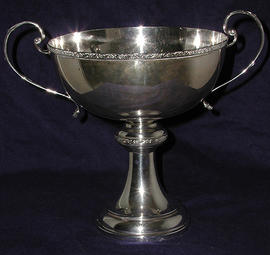 Two handled bowl on silver stand
